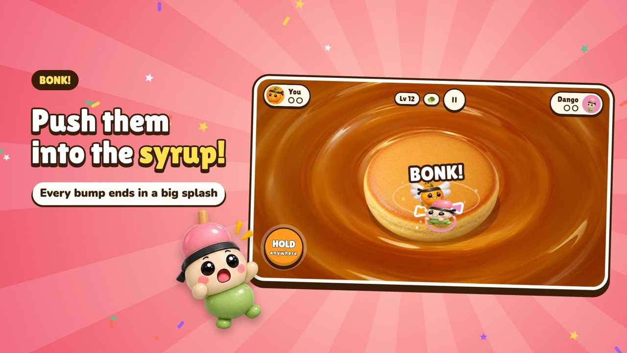 A mochi gets pushed off the pancake into the syrup with a big splash
